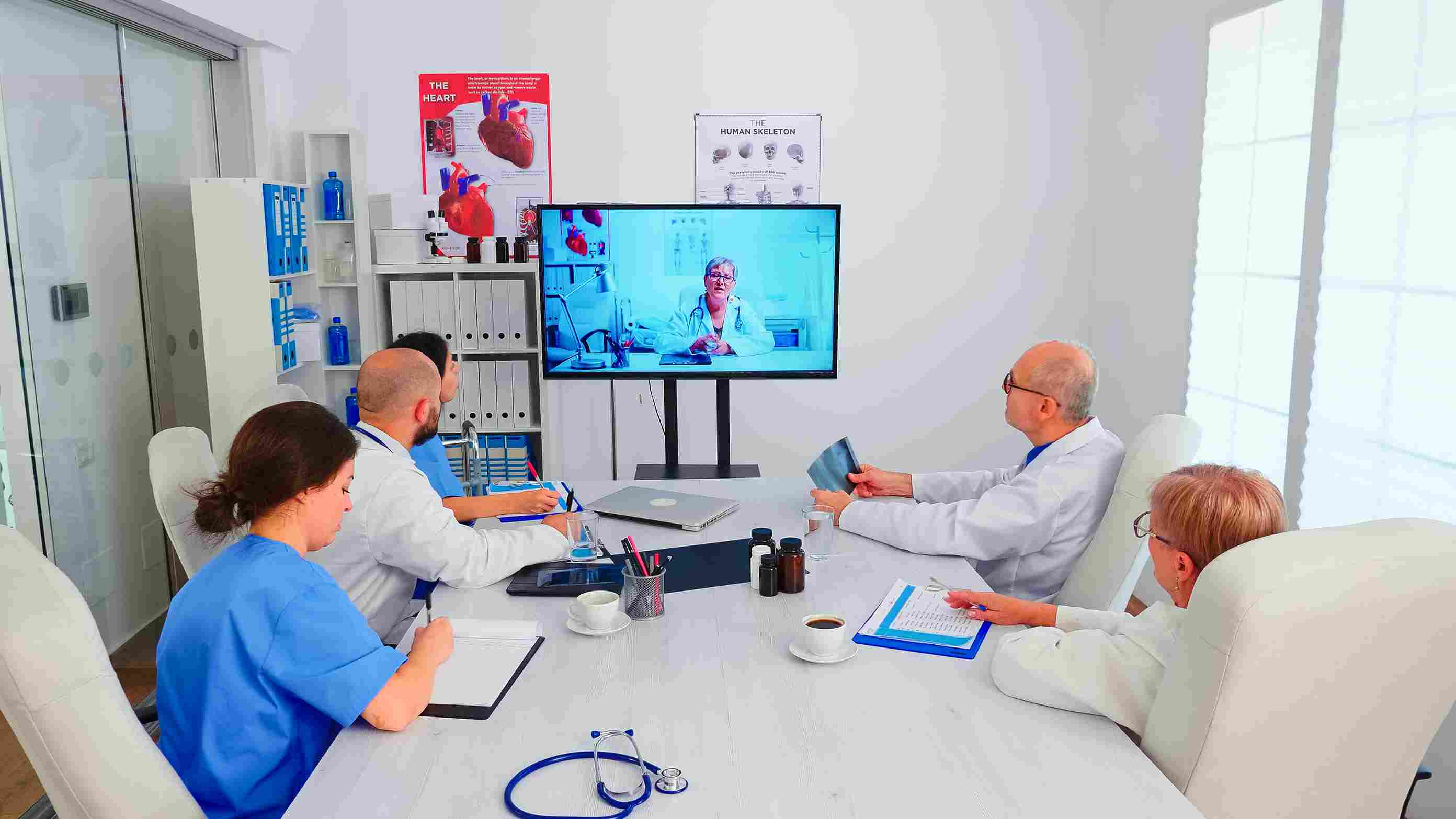 group of doctors participating in video conference