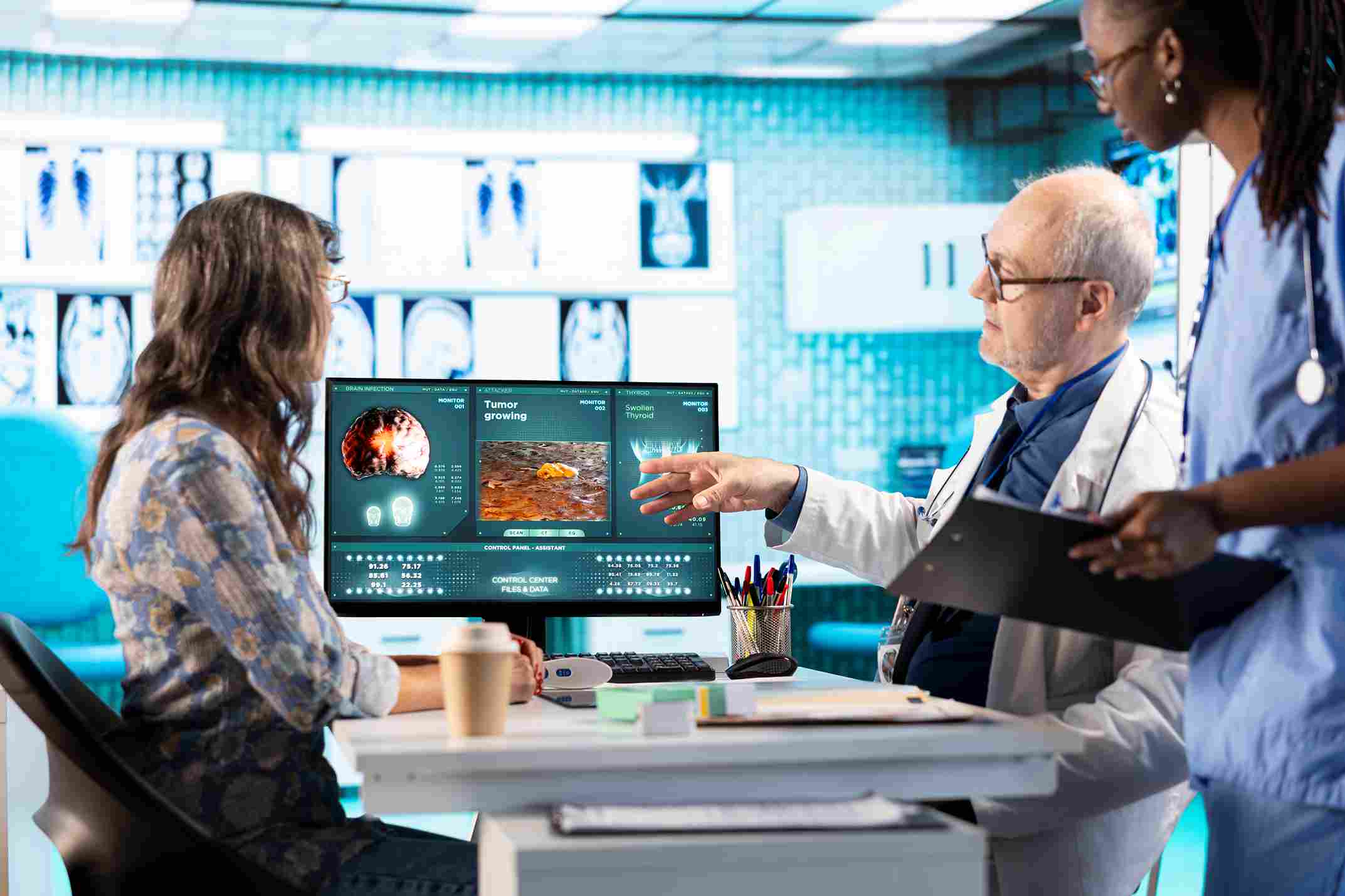 group of doctors and nurses discussing the features of HMS