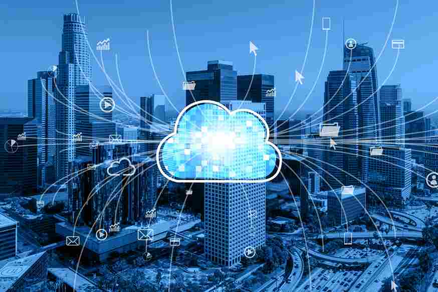 Cloud icon connecting to city buildings, showing cloud computing
