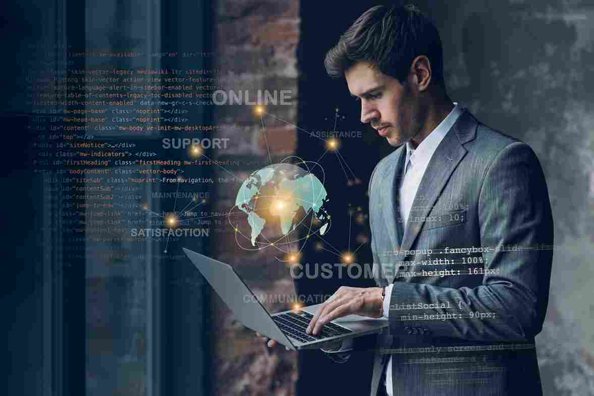 Man on laptop with digital overlays, symbolizing digital strategy